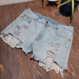 Light wash Jean Shorts with lace pocket decal